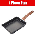 Tamagoyaki Japanese nonstick omelette pan with wooden handle, perfect for cooking egg rolls and small dishes.